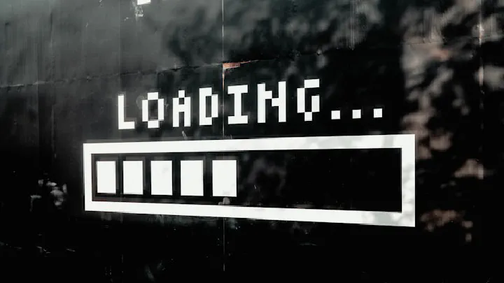 A dark screen displaying the text "LOADING..." above a white, rectangular progress bar.